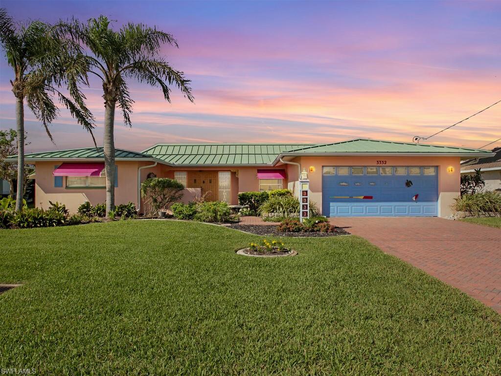Attention boaters, Snowbirds, and investors…$100K price improvement on this beauty!!  This deep water, sailboat access, pool home offers everything you need to enjoy the Florida lifestyle!  Serious boaters will appreciate the 50ft composite dock with water, 50amp power, and less than 10 minutes out to open water!  This home is built for entertaining with the open, great-room concept, kitchen with double oven, pass-thru bar window, and spacious covered lanai.  Slide open the 3-panel glass door wall to bring the outside in!  The extra deep, teardrop shaped pool, with massive travertine deck is great for barbecues and pool parties!   Hop in your boat and spend the day out on the open water, traveling to numerous waterfront restaurants or find quiet Island to anchor at and relax.  Conveniently located close to great shopping, dining, and the mid-point bridge for easy access to Fort Myers.  Metal roof and storm shutters for storm protection and peace of mind.  This is a perfect home for the full time resident or to use as a vacation home and/or vacation rental.  No storm damage here at all and a quick closing is possible!!