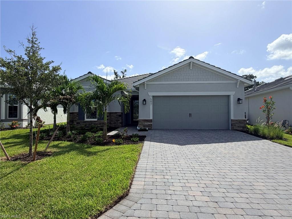 Move to Del Webb Oak Creek! This brand-new Prosperity home estimated completion is August/September 2026. Features stainless steel appliances, white wood cabinets throughout except for the kitchen island cabinets are burlap color, custom backsplash, quartz countertops, tray ceiling at gathering room, full laundry upgrade, 8' doors, tile flooring in main living areas, 2 car garage with 4' extension, walk-in shower at owners’ bath & secondary bath, and Impact glass is included. Enjoy Sliding glass doors at gathering room to the extended covered screened-in lanai with preserve views. Oak Creek is Del Webb’s newest 55+ community, situated in North Fort Myers. Homeowners will benefit from it being a natural gas, gated community with vacation-inspired amenities such as a resort style pool and spa, clubs and activities, a restaurant and covered Tiki, and a full-time lifestyle director. Just beyond the gates homeowners can find shopping and dining, explore Fort Myers River District, relax on the Gulf Coast beaches, and experience new recreational activities while still being only minutes from everyday conveniences.