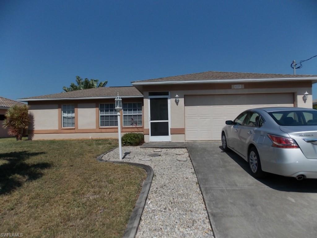 well maintained single family home with 3 bedrooms, 2 bath, swimming pool with waterfall in popular Beach Parkway area. Home is across from Waterfront Properties. It has a split bedroom concept with an open concept kitchen/living room and a separate family room. Big sliding glass doors open up to a good sized covered lanai. Small amount of assessments (water, sewer irrigation) is still open and currently on property taxes.