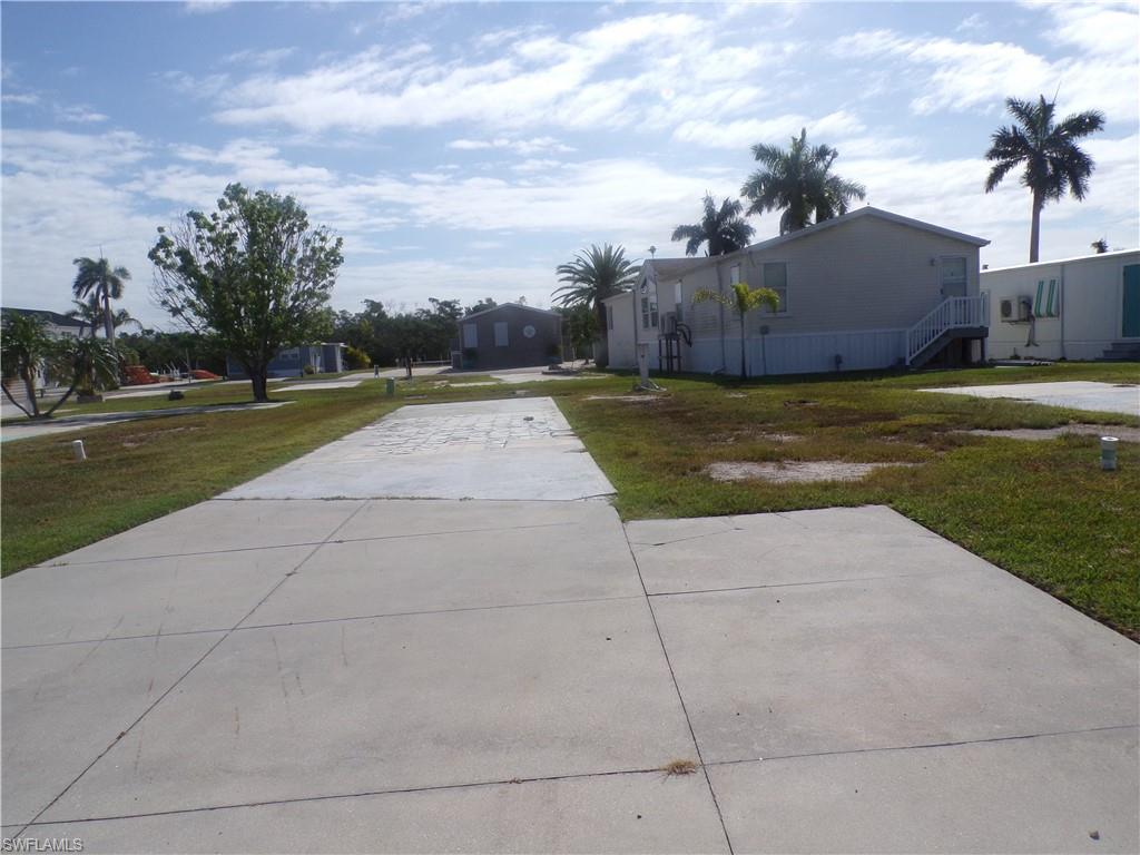 Welcome to Port Carlos Cove Fort Myers Beach. Build your single-family home in this Co-op subdivision. Several new homes have gone up in the area. Clubhouse with a pool, four pickle ball courts and lots to do. Take your bike to the Beach or hang around the pool for affordable Beach living. This community has boating access and boat storage. Most of the lots have the same road frontage and can be built on. Several builders are building right now in the subdivision. Come get your piece of the Beach!
