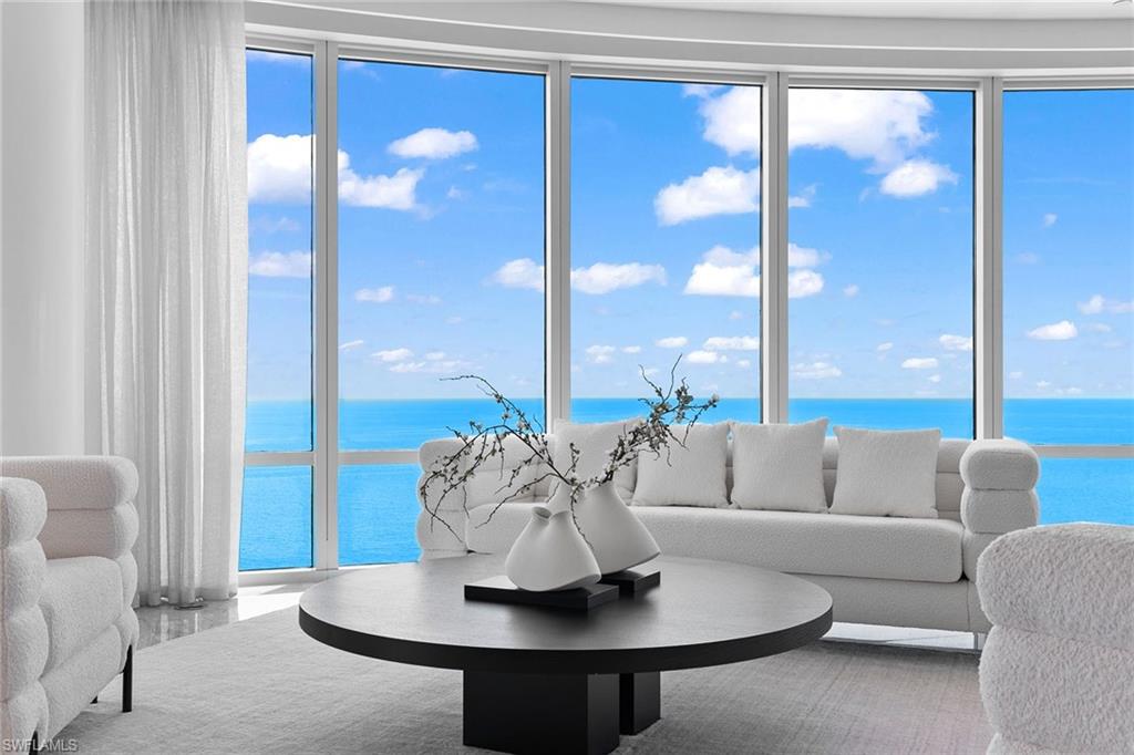 Embrace an unrivaled lifestyle that surpasses all expectations. Indulge in the ultimate luxury experience in the Regent at Park Shore. Extraordinary 12,000-square-foot penthouse offers breathtaking 360-degree views from the gulf to the bay from every room. Renowned designer Naomi Leff has meticulously designed this penthouse, seamlessly blending style and functionality. Floor-to-ceiling walls of windows showcase the stunning surroundings and views, while modern ceiling details and Tamo Japanese Ash accents add a touch of drama. Marble and bamboo floors enhance the ambiance throughout. The kitchen seamlessly connects with the great room and balcony, perfect for entertaining along with the adjoining media room. With five bedrooms, five full and two half-baths, and a serene primary suite with southern vistas, every inch of this property has been thoughtfully designed to engage in an exceptional living experience. With awe-inspiring views, meticulous design and top-notch amenities, this penthouse sets a new standard for luxurious living. Plus, this penthouse includes a private, three-car garage. Regent offers high-level security, first-class amenities and is near Venetian Village.