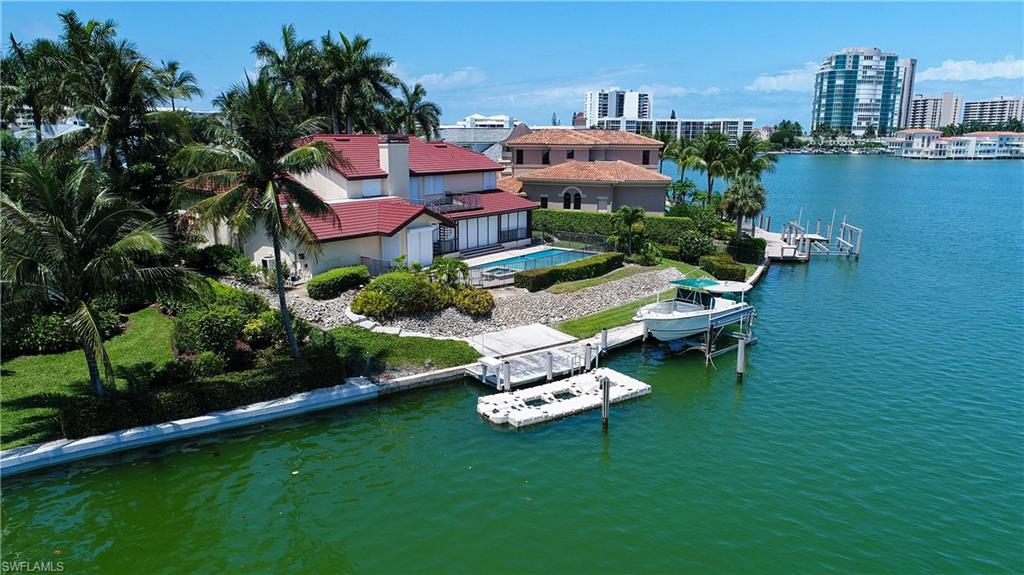 Build your dream home on this half acre lot in the Moorings.  Enjoy your morning coffee or evening cocktail while enjoying your expansive bay views.