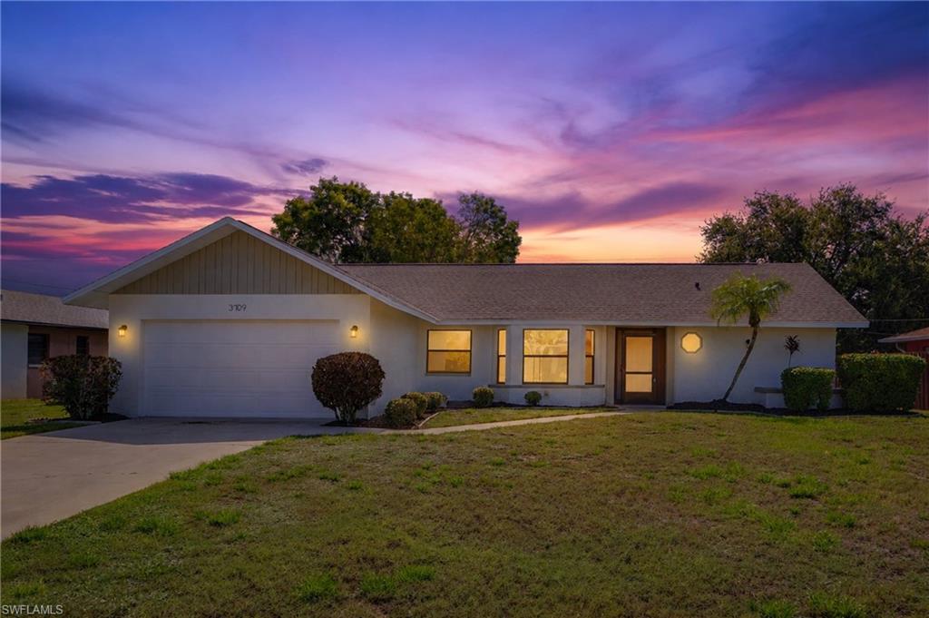 Thoughtfully renovated from top to bottom, this 3-bedroom, 2-bath home offers a fresh, updated feel with a layout designed for comfortable everyday living. The open floor plan creates an easy flow between the living, dining, and kitchen spaces. The kitchen has been beautifully refreshed with quartz countertops, a new tile backsplash, brand-new appliances, and updated fixtures, creating a clean, timeless space. Luxury vinyl plank flooring runs throughout the home, complemented by fresh interior paint and modern finishes that give every room a bright, cohesive look. Both bathrooms have been completely updated with tiled shower surrounds, stylish backsplashes, and contemporary fixtures for a polished, custom feel. A 2023 roof and all-new A/C ductwork provide added peace of mind, making this home as practical as it is beautiful.
Step outside to enjoy the newly screened lanai overlooking the spacious backyard. With approximately 1,500 square feet of living space, a two-car garage, and extensive renovations already completed, this move-in-ready home offers the perfect blend of quality updates, thoughtful design, and everyday comfort in one of Cape Coral's most convenient locations.
