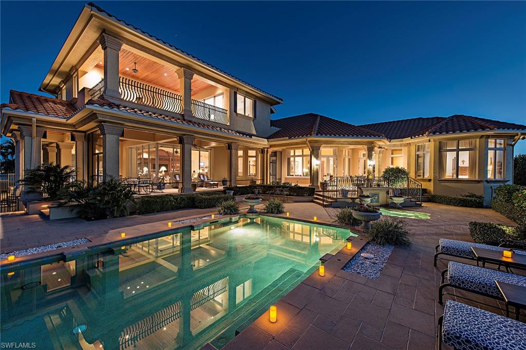 Luxury and elegance define this beautifully upgraded London Bay estate home featuring a dock with two boat lifts, quick direct access to the Gulf, and gorgeous lanai with pool, spa and water feature. This home is located on a private street in the prestigious Estates neighborhood of Marco Island and features upgraded tile flooring, a replaced pool heater and a brand new roof. This home is equipped with a whole house generator, impact glass, electric shutters, high-tech light control system and security system. The interior is decorated with coffered ceilings, crown molding, transom windows, custom window treatments, built-ins, custom mirrors, intricate tile flooring and wood flooring. Entertain effortlessly with the surround sound system, screened lanai with a fireplace and summer kitchen, and beautiful open pool and spa area. The gourmet eat-in kitchen features light cabinetry, tile backsplash, rich granite countertops, gas cooking, double wall oven and island. Additional features include two dens, two balconies, storage space, three car garage, and a bar with wine rack, wine cooler, ice maker, dishwasher and sink. Furnishings Negotiable and decorated by Romanza Interior Design.