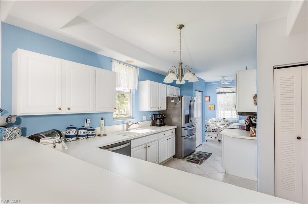 Spacious TOP FL, SOCIAL END UNIT that offers plenty of space to entertain & comes w/ coffered ceilings, a den & plenty of windows that welcome the Florida sunshine. Lots of counter space in the kitchen w/ corian counters & a new stainless steel appliance package. Separate laundry room w/ newer washer & dryer & upper cabinetry. Other upgrades include remote control ceiling fans, rescreened lanai & new custom built in office in the den. Convenient 2nd floor location that's only steps to the ground level or take the elevator down & stroll to the pool that's only a building away. Plenty of guest parking & located on a peaceful street w/ nature preserve across from you. The Legends is a Private country club that offers a wide array of amenities, such as a large Clubhouse w/ a gorgeous waterfall pool & multiple dining options, tennis, bocce, pickle ball, an exercise facility & an aerobics room w/ tons of classes to choose from, everything from Yoga & Pilates to Zumba & Water Aerobics!! Great location too.. Close to shopping, dining, entertainment & the airport. Resort Style living to it's finest. Sold Furnished & waiting for you to add your personal touches to call this Paradise home!!