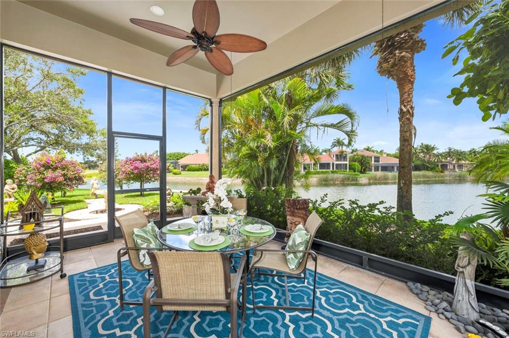 Venezia is an interior neighborhood, providing quiet enjoyment and incredible views. This beautiful residence has private lake views, an oversized lot, and a side garden that captures amazing vistas. Enter this gracious, meticulously cared for home, with its voluminous ceilings, abundant crown moldings, and neutral tile flooring in main areas. The primary suite has open views to the pool and lake yet creates privacy with the landscaping. Wood plank ceramic tile has been added to the suite and two large closets. The gourmet kitchen opens to the breakfast area and family room, with incredible vistas and an abundance of sliding glass doors and windows to let the sunshine spill in. The kitchen is perfect for whipping up dinners, with a gas range and Jenn-Aire appliances and plenty of storage, including two pantries. The screened-in lanai is ideal to dine al fresco, listening to the birds from Banyan Island just around the bend and enjoying the serene, colorful sunsets. This home has a whole-house generator & a 2-car garage with tile floors and custom storage, plus room for a golf cart. Grey Oaks is truly a place to call home, centrally located with world-class amenities. Welcome home!