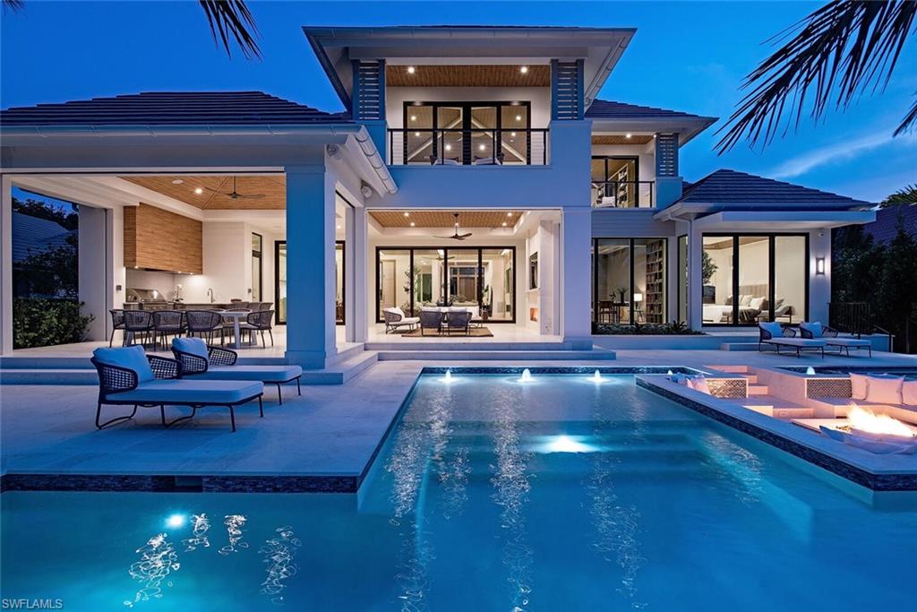 Perfectly positioned on the wide waters of Treasure Cove this new custom residence offers incredible views! Designed by Stofft Cooney Architects, conscientiously constructed by Waterside Builders, Inc. and exquisitely appointed by Jeffrey Fisher Home. Only the finest in finishes and selections with a leaning towards a cleaner, more contemporary design. Warm woods and cool stones provide a great backdrop for splashes of color. Wolf and Sub-Zero appliances highlight the stunning gourmet kitchen and well sorted prep kitchen. Massive island provides a perfect gathering area while meals are prepared. Spacious great room opens up to the covered outdoor living areas where the views of Treasure Cove are simply stunning. 5 Bedrooms in total, including a true VIP suite on the second level, 6 full and 2 half baths, club room/office and a lounge on the second level. There is a 4 car garage for the auto enthusiast. Immediate Port Royal Club eligibility.