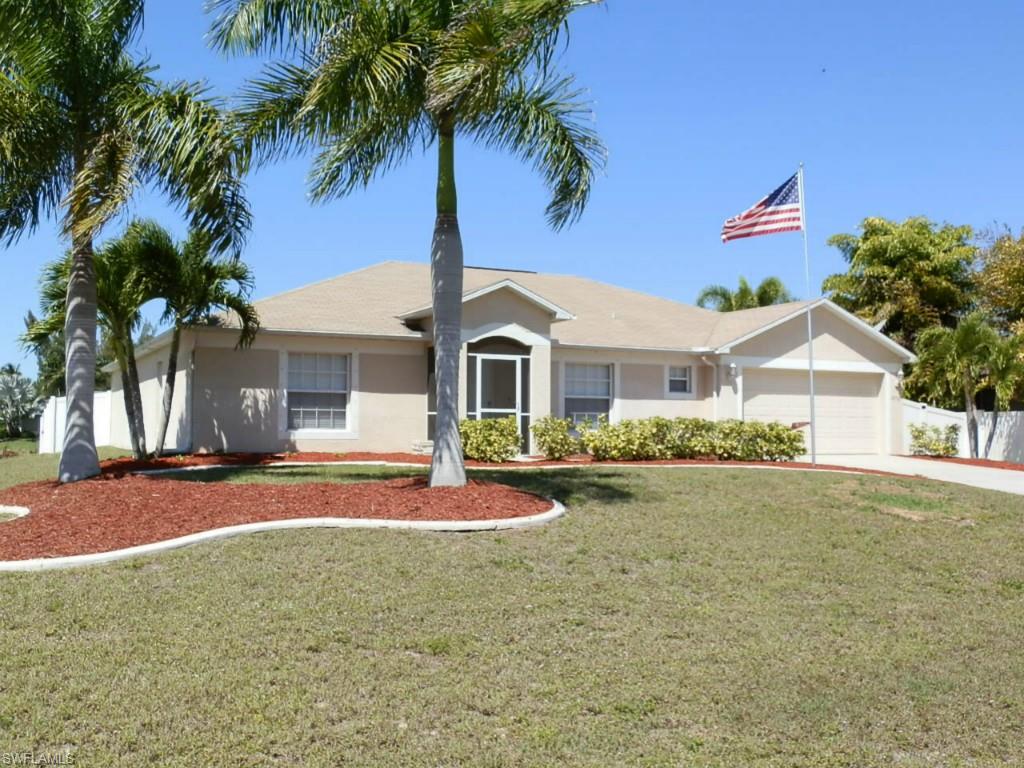 Job opportunities have owners relocating. Centrally located in beautiful SW Cape Coral, this spacious 4BR/3BA pool home could be your family's own slice of paradise. Situated on an oversized corner lot, this home features a family-style, eat-in kitchen with granite counter tops and a spacious island.  French doors open to a Den near the front of the home. A bonus room opposite the Den can easily be used as a play space, dining room, or sitting room. Hardwood floors span from the entryway through the kitchen and eating areas, and tile covers the remaining living areas. Three bedrooms feature carpet while the fourth is tiled and would be great for a fitness/game room or extra storage.  A year-round outdoor entertaining area includes a spacious pool deck, outdoor speakers, fenced-in back yard for privacy, and western exposure for watching the beautiful Florida sunsets. This home has been updated with the precious Florida environment in mind, including a new energy efficient Trane A/C system, GE water heater, Pentair pool pump, and water conserving dual-flush toilets all helping with monthly utility bills.  Don't let this one get away - call for your showing today!