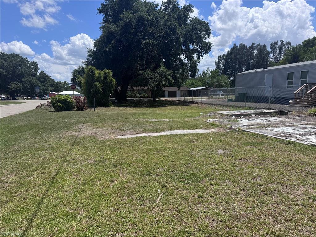 Vacant corner lot on .11 acres cleared. Site ready for residential-use build or for a manufactured home!