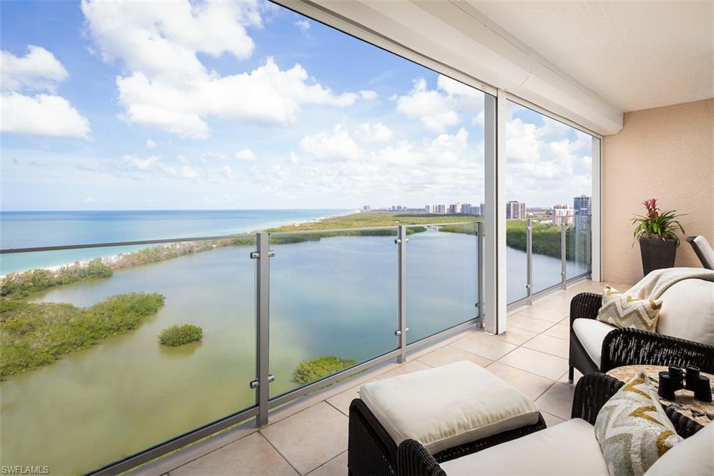 Spectacular Sunsets, Beautiful Beaches, Unique Spaces.  This beachfront jewel with interiors by a reputable local interior designer has 3 bedrooms, 3 full baths, a den with floor to ceiling windows, and a spacious covered balcony. Perched on the 17th floor, you will be mesmerized by the most amazing views of Venetian Bay, the city to the east and the Gulf of Mexico and Clam Pass to the west.  You'll enjoy a unique level of privacy and tranquility in this special gem in Baypointe within the exclusive 24/7 guard-gated enclave of Naples Cay. Living the Baypointe lifestyle affords a beautifully renovated building with a resort style swimming pool, large sunset deck, stunning social room with catering kitchen, state of the art fitness room, tennis courts, elegant owners lobbies with just 3 units per floor, three guest suites, new elevators, and pets are welcome. Upscale shopping, dining and entertainment await at Venetian Village, Waterside shops, and Artis-Naples. Come live your best life on the beach!