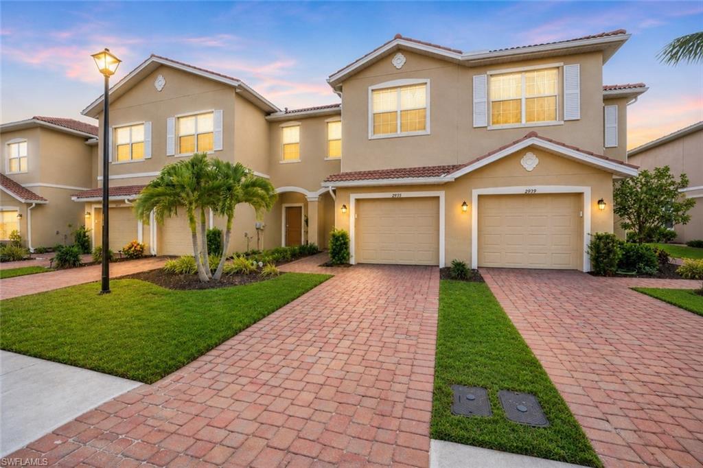 Welcome to one of the BEST VALUES in Orange Blossom Ranch! Located in the highly desirable PHASE II section of the community, this nearly 1,900-square-foot townhome offers a rare combination of LOWER HOA FEES, NEWER CONSTRUCTION, and incredible WESTERN-FACING VIEWS that create some of the most spectacular sunsets in all of Naples!

From the moment you walk inside, you'll notice the bright, open layout featuring 9-FOOT CEILINGS ON BOTH FLOORS, creating a spacious and airy feel throughout. The fresh ALL-WHITE INTERIOR gives the home a clean, modern aesthetic and makes it feel practically brand new. Whether you're searching for a PRIMARY RESIDENCE, SEASONAL RETREAT, or INVESTMENT PROPERTY, this home is completely MOVE-IN READY and ready for its next owner.

The true highlight of this home is the view. Step out onto your private screened lanai and enjoy breathtaking SUNSET VIEWS across the wide-open green space behind the home. During Southwest Florida's summer months, you'll have a front-row seat to nature's most impressive light show as distant thunderstorms illuminate the horizon with dramatic lightning displays. It's a view that changes daily and provides an outdoor living experience that few townhomes can match.

Built in the newer PHASE II section of Orange Blossom Ranch, this home benefits from SIGNIFICANTLY LOWER HOA FEES while still providing full access to the community's incredible RESORT-STYLE AMENITIES. Residents enjoy multiple resort pools and spas, a fitness center, tennis courts, pickleball courts, basketball courts, volleyball, fishing piers, playgrounds, walking paths, and an active community atmosphere.

Orange Blossom Ranch remains one of Naples' most sought-after communities thanks to its TOP-RATED SCHOOLS, family-friendly environment, beautiful lakes, and convenient location near shopping, dining, healthcare, and everything Southwest Florida has to offer.

If you've been searching for a NAPLES TOWNHOME FOR SALE with LOWER HOA FEES, NEWER CONSTRUCTION, 9-FOOT CEILINGS, WESTERN EXPOSURE, STUNNING SUNSET VIEWS, and RESORT-STYLE AMENITIES, this opportunity deserves a place at the top of your list.

PRICED AGGRESSIVELY. MOVE-IN READY. LOWER HOA FEES. NEWER PHASE. INCREDIBLE SUNSET VIEWS. SPACIOUS FLOOR PLAN. 9-FOOT CEILINGS. READY FOR IMMEDIATE OCCUPANCY.