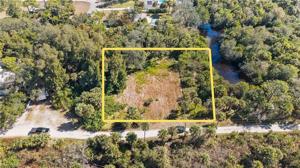 Come see this private Hideaway ready for you to build your piece of paradise. A must see private, cleared Gulf-access lot tucked away on a quiet dead-end street. Situated on a canal with direct access to the river and onward to the Gulf of Mexico, this property opens the door to endless boating, fishing, and waterfront adventures.

The setting is secluded and peaceful, yet conveniently located with easy access to I-75, making trips to shopping, the airport, entertainment, and medical facilities effortless. The seller has personally measured the water levels at low tide and it measured 13FT or more each time. On calm days, you’ll spot snook and manatees basking at the end of the canal with fantastic fishing and nature at its finest right in your backyard.

Nestled within a Lee County conservation area and bordered by protected wildlife refuge, this lot offers rare privacy with neighbors limited to birds, fish, and native wildlife. It’s a truly special opportunity to enjoy the scenic beauty and natural lifestyle that makes Southwest Florida living so desirable.