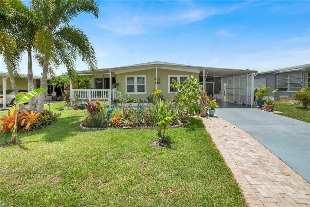 Welcome to Imperial Harbor, an exceptionally well-maintained residence offering comfort, flexibility, and incredible value in the heart of Bonita Springs. Located on owned land within a quiet 55+ community with no mandatory HOA fees, this property presents a rare opportunity to enjoy Southwest Florida living with both freedom and affordability.
Inside, the home offers more than 1,500 square feet of thoughtfully designed living space with a layout that feels open, functional, and inviting. Recent updates; including newer flooring, updated windows (2022), upgraded ductwork (2023), a newer water heater (2021), and a recently replaced AC system (2022) provide peace of mind and make this home truly move-in ready. The interior features two spacious bedrooms with private ensuite bathrooms, expansive living and dining areas ideal for entertaining, and a versatile flex space off the kitchen that can easily accommodate a home office, dining area, or hobby room. One of the most enjoyable spaces in the home is the bright Florida sun room, adding approximately 300 square feet of additional living space filled with natural light. Outside, enjoy the convenience of a covered carport, screened lanai, and detached storage shed with plenty of room for tools, seasonal items, or recreational equipment. Select furnishings are negotiable, creating an easy transition for the next owner. Beyond the home itself, the location is what truly elevates this opportunity. Just minutes from Downtown Bonita Springs, residents can enjoy Riverside Park, local restaurants, coffee shops, live entertainment, art festivals, and the growing energy surrounding the revitalization of the area. Gulf beaches, shopping, dining, and everyday conveniences are all within close reach, making this an ideal seasonal retreat or full-time residence. With continued growth and investment throughout Bonita Springs, this property represents an exceptional opportunity to secure a well-cared-for home in one of Southwest Florida’s most desirable and evolving communities.