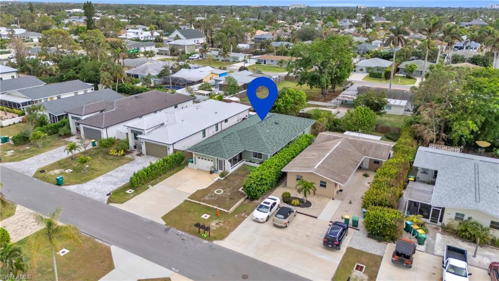 Seller Financing available! Easy Terms available. Welcome to this beautifully maintained 3-bedroom, 2-bathroom single-family home in the highly desirable North Naples area. Perfectly located just a short walk to the white-sand beaches of the Gulf, this home offers the ideal blend of coastal charm, modern comfort, and investment potential.

Step inside to an open and inviting floor plan designed for both relaxation and entertaining. The modern kitchen features sleek appliances, ample counter space, and a seamless flow into the dining and living areas—perfect for gatherings or quiet evenings at home.

The primary suite provides a peaceful retreat with its own en-suite bath, while two additional bedrooms offer flexible space for guests, family, or a home office. The second full bathroom is tastefully updated and functional for daily living.

Enjoy Florida’s sunshine year-round in your private backyard oasis—a tranquil setting for morning coffee, weekend grilling, or unwinding after a day at the beach.

Located minutes from shopping, dining, and entertainment, this home truly captures the essence of Naples lifestyle living. With proximity to the beach and strong rental potential, it’s a fantastic opportunity for both investors and seasonal homeowners seeking immediate income and long-term value.

Don’t miss your chance to own this North Naples gem—where location, lifestyle, and opportunity meet!