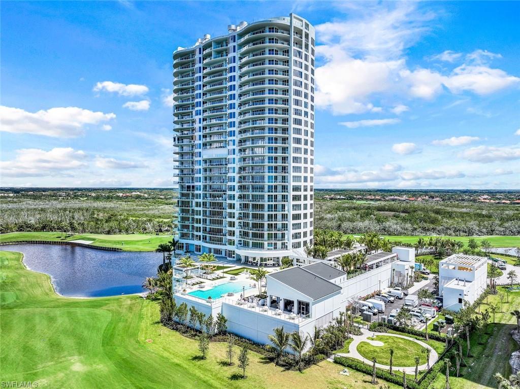 2023 Collier County award winner for 'Best Interior Design of the Year' by Clive Daniel Home Naples! Brand new & never lived in: The ONLY available '03' (end) unit featuring 240° of unobstructable preserve views from sunrise to sunset! No expense spared, move in ready. Floor to ceiling windows with over 10' ceiling height. The exquisite interiors provide a modern luxury lifestyle. Premium Wolf & Sub-Zero appliances w 36" gas cooktop in a chef-inspired kitchen, open living spaces facing the Gulf, Estero Bay and the private Golf Course. European-style cabinetry, double quartz waterfall kitchen island, large walk-in primary shower with free-standing tub, 2 expansive balconies adding over 1,000sf of outdoor space with glass railing for uninterrupted vistas. Upscale amenities comparable to the world’s top resorts: Infinity edge pool w Beach entry, Fire Pit Terrace, Pool Pavilion, Putting Lawn, and a 4,000sf 'penthouse level' Owner's Roof Top Terrace for spectacular long distance sunset views, with bar area, BBQ kitchens and extensive seating areas. Other luxury amenities include a Grand Salon, Card Room, Library, Movie Theater, Fitness, 3 Guest Suites, and a 24 hour staffed front desk.