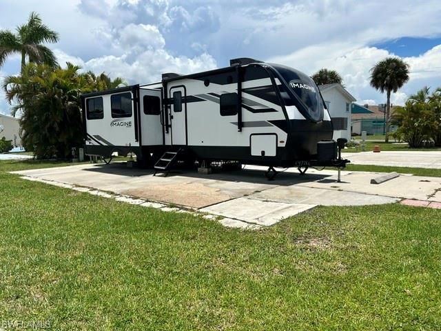 Create your perfect Florida getaway on this vacant lot in a sought-after gated 55+ community. Ideal for a mobile home or RV, this vibrant neighborhood offers an active lifestyle with two swimming pools, pickleball and tennis courts, a clubhouse, organized activities, and year-round social events. Conveniently located just minutes from beautiful Gulf beaches, shopping, dining, entertainment, and healthcare facilities. Whether you're looking for a seasonal escape or a full-time residence, this is a wonderful opportunity to enjoy the best of Southwest Florida living in a friendly and welcoming community.