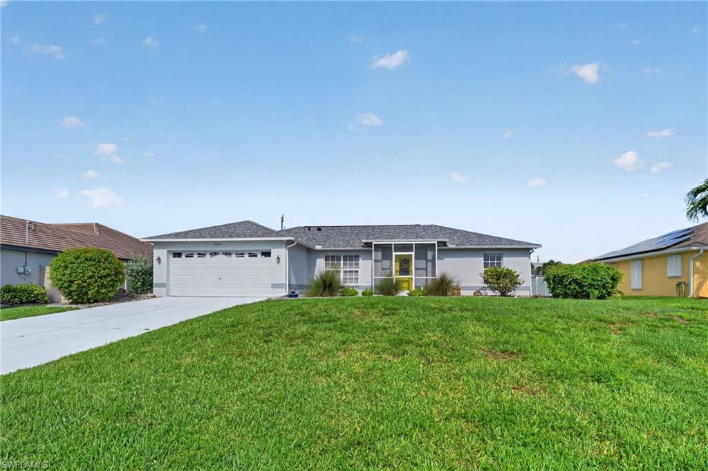 Welcome to this beautifully maintained and thoughtfully updated 3-bedroom, 2-bath home with a 2-car garage in desirable Southwest Cape Coral. Offering the perfect blend of comfort, value, and peace of mind, this move-in ready home features major updates already completed, including a 2021 roof, 8 impact-resistant windows, an impact front door, and an impact sliding glass door installed in 2012.

Step inside to find a bright, open layout with a combination of tile and wood-look flooring throughout. The kitchen is equipped with stainless steel appliances, including a new dishwasher, while the remodeled primary suite features an updated shower, granite countertops, and stylish tile finishes.

One of the home’s standout features is the oversized extended screened lanai. Complete with a coffered ceiling, tile flooring, recessed lighting, and a shingle roof, this expansive outdoor living space is ideal for entertaining, enjoying morning coffee, or simply relaxing year-round.

Additional updates include a 2017 A/C system, brand-new water heater (2026), freshly painted exterior, and washer and dryer included with the sale.

With no HOA fees and numerous major improvements already completed, this well-cared-for home offers exceptional value in one of Southwest Cape Coral’s most desirable locations. Conveniently located near shopping, dining, schools, parks, and everyday amenities, this is an opportunity you won’t want to miss.
