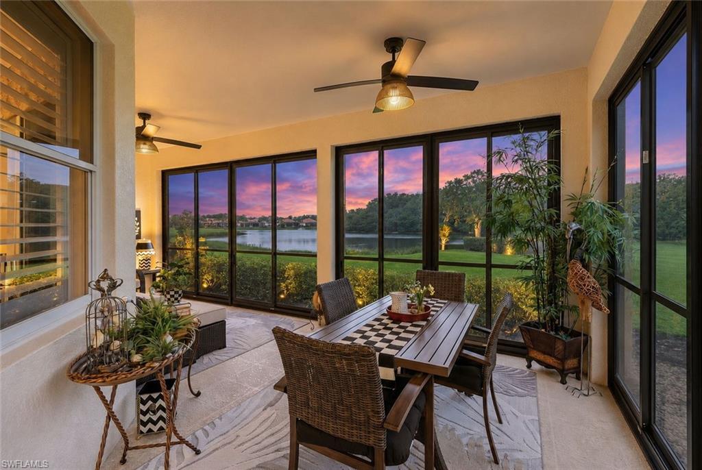 Perfectly positioned within Cypress Cove at Wildcat Run Golf & Country Club, this end-unit coach home showcases expansive western-facing lake views and breathtaking Southwest Florida sunsets, along with the ease of low-maintenance ownership. Offering over 1,600 square feet of living space and an attached 2-car garage, the residence is perfectly suited for effortless year-round living or as a lock-and-leave seasonal retreat.
The thoughtfully designed floor plan features 3 bedrooms and 2 baths, with the guest bedrooms situated separately from the primary suite to provide privacy and flexibility for visitors, a home office, or hobby space. The updated kitchen is both functional and inviting, showcasing granite countertops, stainless steel Frigidaire appliances, a large breakfast bar, and a sunny breakfast nook with sliding glass doors leading to the lanai. The spacious primary suite serves as a peaceful retreat with private lanai access, a large picture window framing tranquil lake views, a generous walk-in closet with custom built-in shelving, and an updated ensuite bath featuring dual vanities and a large walk-in shower. The open-concept great room seamlessly extends into the enclosed lanai, thoughtfully finished with plexiglass sliders that offer the best of both worlds. Enjoy this versatile space under air-conditioned comfort year-round, or open the panels to let in the gentle Florida breezes while taking in the tranquil lake views and spectacular sunsets. For added peace of mind, a brand-new Trane 2.5-ton air handler and compressor were recently installed and include a 10-year parts warranty. Residents of Wildcat Run enjoy an exceptional lifestyle within one of Estero's premier golf and country club communities. Set across 600 acres of lakes, preserves, and beautifully landscaped green space, this low-density community offers a serene setting with abundant wildlife, scenic views, and room to breathe. Amenities include an 18-hole Arnold Palmer Signature golf course, tennis, pickleball, bocce, a state-of-the-art fitness center, dining venues, and an active social calendar. Ideally located near Coconut Point, Gulf Coast Town Center, Miromar Outlets, Southwest Florida International Airport, and the area's white sand Gulf beaches, this residence offers the perfect combination of scenic beauty, exceptional amenities, and an unbeatable Estero location.