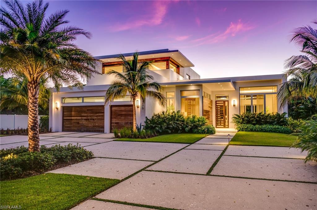 Welcome to a new and refreshing "Tropical Modern" design in The Moorings.  This brand new 4 bedroom, 4.5 bath, plus den open concept floor plan, has a spacious main floor master suite with three additional second floor bedroom suites.  The large epicurean kitchen has custom cabinets, Wolfe, Subzero and Bosch appliances and a 16' Pompeii Quartz island.  The great room meets the enchanting back yard with a mix of limestone, chocolate quartz counters, and multiple seating areas. The outdoor entertainment area features a covered lanai with kitchen that overlooks lush landscaping surrounding the pool, spa and fire pit gathering area.  This is a refreshing, new modern design for Naples, maximizing light and views to accent and enhance your living experience.