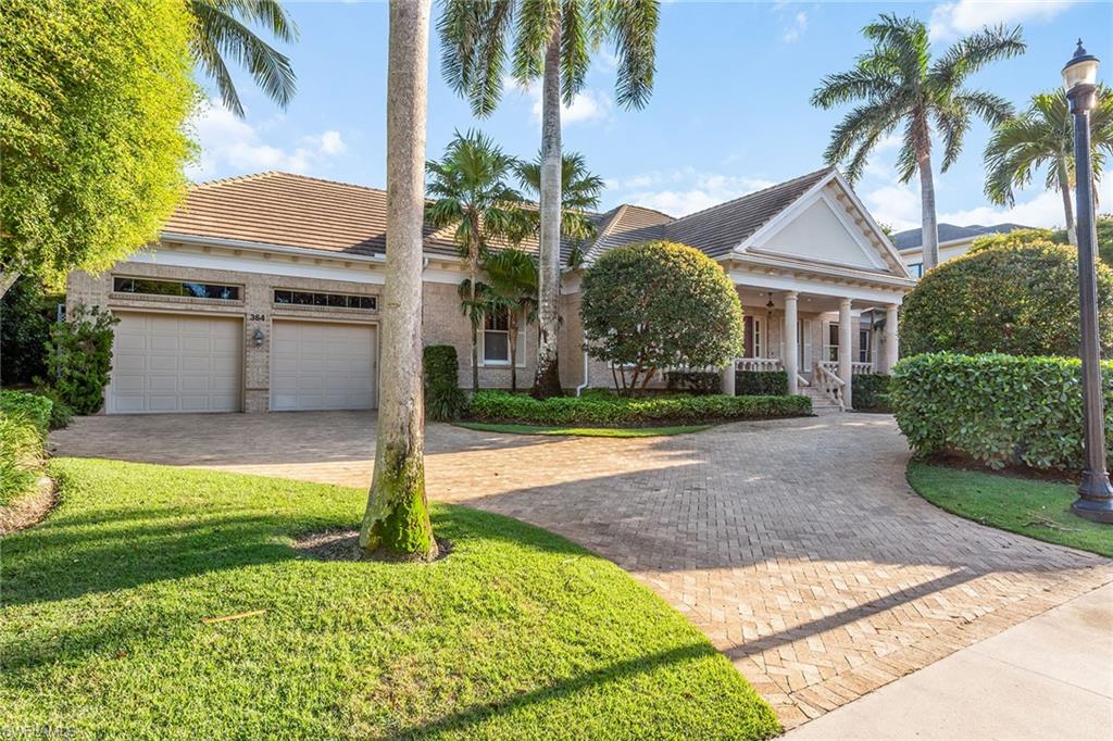 Refined and sophisticated brick facade estate home in Bay Colony Shores with 3 bedrooms + den and 3.5 bathrooms situated on a professionally manicured lakefront lot. The tasteful interior features marble and wood floors, blond wood kitchen cabinetry, granite countertops, Sub-Zero refrigerator freezer, wine cooler, Fisher & Paykel dishwasher, oversized crown moldings, classic formal dining, gracious French doors, private office or bonus room adjacent to the primary suite, large jetted spa bath, and outdoor seating and entertaining areas with grill on an expansive pool deck. Bay Colony residents enjoy the private Bay Colony Beach Club and the Bay Colony Tennis Club, as well as the two private beach clubs at Pelican Bay and amenities.