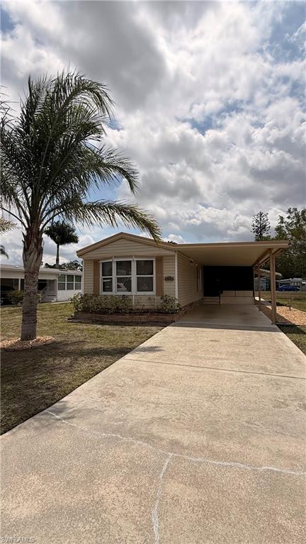 Embrace the ultimate Southwest Florida lifestyle in this recently listed 55+ community home. Located just a mile from the heart of historic Old Bonita Springs, you’ll be minutes away from local festivals, parks, and dining while enjoying a peaceful neighborhood retreat. A single wide home that lives like a double wide!  A tour is a must to appreciate the spaciousness of this home!  The home features vaulted ceilings throughout, updated flooring throughout, 2 spacious bedrooms along with 2 generous baths.  Primary bedroom also has huge walk in closet.  Living room is open to full sized kitchen with plentiful countertops and cabinetry.  There are multiple areas  in this home to consider for dining.  The four season Florida Room is perfection! Laundry inside the utility room off the Florida Room. Generous covered parking.  A sidewalk winds around the home to a rear patio for private relaxation overlooking a canal.  Quite a bit of storm protection has been added!  Bonita St James Village is an age restricted Co-Op community.  Cash purchase includes a Co-Op ownership share in Bonita St. James Village. Monthly HOA of just $95! Where else is paradise so affordable?! HOA fee covers a community pool, spa, community center, trash, lawn maintenance (inc mowing, edging, (2) tree maintenance) roads, fenced storage area and other common expenses. Minutes to dining, post office (.9 miles), library (1.8 miles), Bonita Beach (6.5 miles) and shopping. Come and experience the climate, history, culture and nature of paradise! Restrictions require one resident must be age 55 or above, the other may be age 45 or above. 118 homesites, approximately 1/3 occupied fulltime. Leasing w/restrictions. Pets w/restrictions.