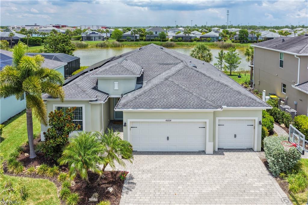 Welcome to your piece of paradise in the sought-after Trails Edge neighborhood of Babcock Ranch! This beautifully maintained, move-in ready home offers the perfect combination of comfort, efficiency, and Florida lifestyle living.

Featuring 4 bedrooms, 2 bathrooms, and over 2,200 square feet of thoughtfully designed living space, this home boasts a bright, open-concept floor plan ideal for both everyday living and entertaining. The spacious primary suite provides a peaceful retreat with plenty of room to relax and amazing lake views, while the additional bedrooms offer flexibility for family, guests, or a home office.

Step outside to enjoy the fully fenced backyard overlooking a tranquil lake view, creating the perfect setting for morning coffee, evening sunsets, and outdoor gatherings. The screened lanai is equipped with automatic roll-down hurricane screens, providing both convenience and peace of mind.

This home is loaded with valuable upgrades, including whole-house solar panels for exceptionally low electric bills and a whole-house water filtration system. With these major improvements already in place, you can enjoy all the benefits without the added expense.

Located just minutes from Babcock Ranch schools, shopping, dining, parks, walking and biking trails, and Founder's Square, you'll love the convenience of having everything this award-winning solar-powered town has to offer right at your fingertips. 

Experience the Babcock Ranch lifestyle—where community, sustainability, recreation, and small-town charm come together. All that's left to do is move in and start enjoying it.
