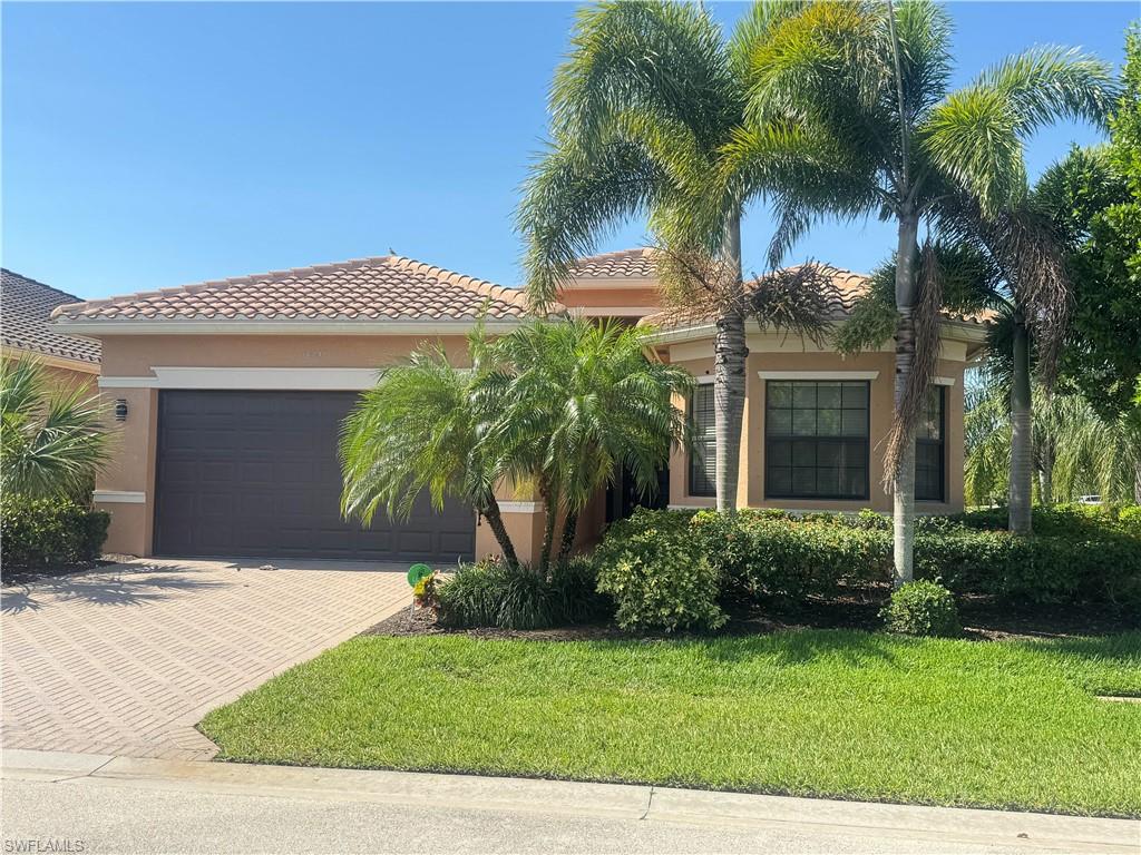 Welcome to this wonderful property featuring 3 bedrooms + office, 3 bathrooms, and a 2-car garage, complemented by a spacious screened-in lanai. This home offers wood and tile flooring. The kitchen is equipped with stainless steel appliances, a large island, and elegant granite countertops. Experience the airy and open layout, adorned with captivating tray ceilings, delightful lighting, and generously sized rooms. The primary suite has an expansive layout, offering an en-suite bathroom with dual vanities, a relaxing bathtub, a separate walk-in shower, and ample closet space. Marina Bay is a gated community conveniently situated within a short 15-minute drive from RSW International Airport. Downtown Fort Myers is only 20 minutes away, and offers many waterfront attractions and upscale dining experiences. Embrace the lifestyle with access to the community clubhouse, brimming with amenities catering to both children and adults alike. This is a sanctuary where luxury living meets unrivaled convenience. Call today!