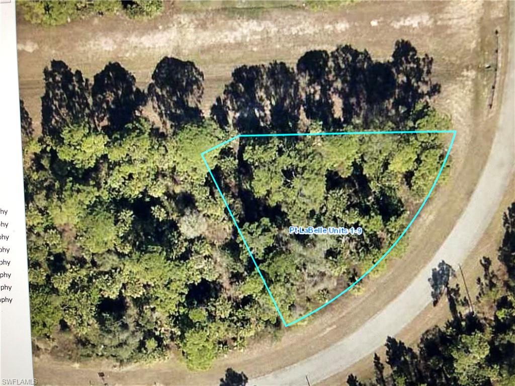 Large pie shaped lot on the end with green space behind and on the side.  This lot is bigger than most at over .3 acres.  It is 5 minutes from the middle school, a short distance to downtown Labelle in a growing area of Hendry County.    Small town Florida living is getting rare so please check out the lot today.  Call me today for further information.