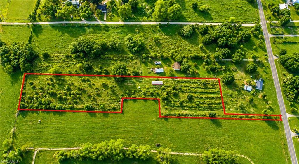 Private 5.05- Acre Retreat on Prestigious Fort Denaud Road

Now available-this beautiful 5.05-acre tract offers the perfect blend of privacy, space, and convenience in one of LaBelle's most desirable areas. Tucked away behind an existing residence on a 1+ acre parcel, this secluded homesite provides peaceful setting with the added benefit of a deeded roadway for access. 

The acreage is cleared and dotted with scattered trees, creating a picturesque canvas ready for your dream home. Zone Agricultural Residential, this property allows for animals, making it ideal for those seeking a mini-farm, equestrian setup, or a true country lifestyle. 

A 20' x 60' steal equipment carport is already in place-perfect for storing machinery, RV's, boats, or building materials while you develop the property. 

Located just west of town near the Fort Denaud Bridge, this property offers easy access to LaBelle, Fort Myers, and Interstate 75, making commuting and travel convenient while still enjoying the tranquility of country living. 

Please note: Property will require installation of a well and septic system. 

Don't miss this opportunity to own a private slice of Southwest Florida with room to grow!
