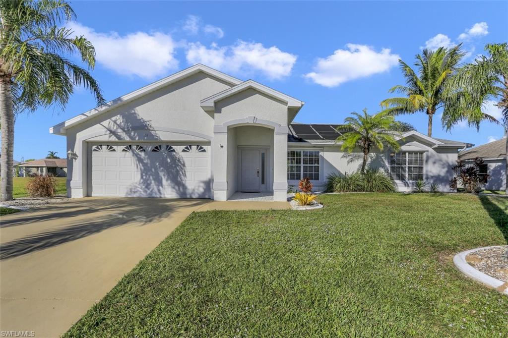 NEW ROOF 3/21. NEW ELECTRIC PANEL 3/21. AC Replaced 2016. Electric Pool Heater 2015. PVC Re-Pipe 2015. Water heater replaced 2020. Stainless appliances replaced 2020. Welcome to your new Florida Home! Centrally located near 2 main thoroughfares - Santa Barbara Blvd and Veterans Pkwy. Beautiful split bedroom floor plan with a large open living area with a breakfast bar leading into the kitchen. 3 doorways to access the covered lanai area and bright open pool area with a waterfall into the electric heated pool. Mature landscaping offers privacy while by the pool. Enjoy the beautiful sunny Florida days next to the pool while entertaining guests under the covered lanai with quick access to the kitchen, living room, and guest bathroom. The Master bedroom has a large tub separate from the shower. The guest bathroom has a shower/tub combo. Highest and best offer by 12 PM Saturday, March 13th. Schedule a showing with your real estate professional today to view the home of your dreams. Sold turnkey with all furniture and decorations. Water & Sewer Assessments in and paid.