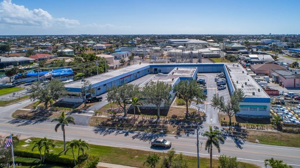 Commercial condo unit only for sale. Could be car storage garage, workshop, other C5 business uses, or even "Man Cave". Currently set up a self storage bays framed up & built out inside condo unit.