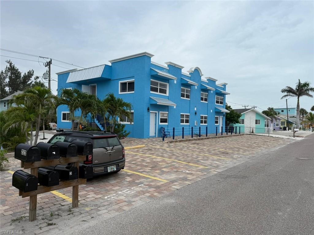Hard to find 8 unit building on FMB! Rent weekly or annually! 8 UNITS, Huge income opportunity. This is truly a rare upscale rental within a short walk of Beach, shopping and dining. Currently doing annual rentals but can easily be a resort-style property with weekly rentals BUilding has 8 units. 4 bottom units were completely redone with permits due to hurricane flooding. THis includes plumbing, electric, HVAC. All redone on the second floor, as well as HVAC system replaced inside and out. Property located in weekly zone rental. Listing broker is co-owner. Owner financing available with substantial down payment. No showing prior to proof of funds or pre-approval letter from a financial institution. Due diligence period not to exceed 14 days.