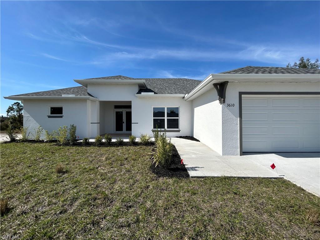 Introducing a stunning newer construction 4-bedroom, 2-bathroom home in the desirable location of Cape Coral, FL. This modern house features stainless steel appliances, all-tile flooring, and walk-in closets for ample storage space. Enjoy the convenience of washer/dryer hookups in both the inside laundry room and covered open lanai. Take in the serene view of the fresh water canal from the lanai, perfect for relaxing or entertaining guests. Don't miss out on this opportunity to make this house your new home.  Small pet considered with non refundable pet fees .