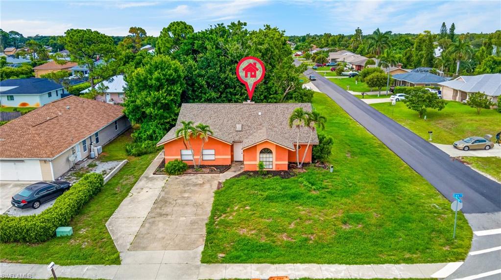 Fantastic opportunity to own this spacious 4 bedroom plus den, 2 bathroom home situated on a corner lot with no HOA restrictions, offering the freedom and flexibility to make it your own.  With no HOA restrictions and its desirable location, this property also offers excellent lease potential, making it a great option for both homeowners and investors. Recent updates include fresh interior paint and a brand-new roof installed in 2026, providing added value and peace of mind. Ideally located just minutes from the Alico Corridor, I-75, Three Oaks Parkway, and US 41, this home offers convenient access to shopping, dining, Southwest Florida International Airport (RSW), Florida Gulf Coast University (FGCU), and all the everyday conveniences Southwest Florida has to offer.