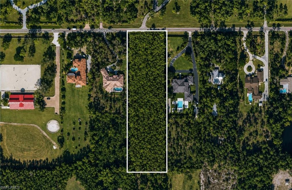 An exceptional 2.5-acre homesite in the heart of Livingston Woods, perfectly positioned with coveted Southern exposure and a setting that invites something truly extraordinary.the price includes the mitigation and preparation of the lot for the “To be built home” with building plans readily available, offering a streamlined path to bring your vision to life. Crafted for those who appreciate control and a more private process, this presents a rare opportunity to build a custom estate without the added costs. Design on your terms, at your pace, and with a level of personalization that simply cannot be replicated. Set among Naples’ most prestigious acreage estates, this property delivers the space, privacy, and flexibility that define the Livingston Woods lifestyle, all just moments from world-class dining, shopping, and the Gulf. A compelling and increasingly rare chance to build a legacy residence in one of the most sought-after locations in all of Naples