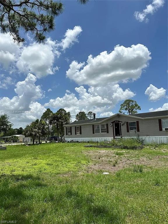 Welcome to your own piece of paradise in Clewiston Montura Ranch! This stunning manufactured home boasts 4 bedrooms and 2 bathrooms, perfect for a growing family or those who love to entertain guests. The interior features tile counters, white appliances, and tile flooring throughout, giving the home a modern and sleek feel. Situated on 1.25 acres of land, there is plenty of space for outdoor activities and enjoying the beautiful Florida weather. The property also includes an outdoor chicken coop and an open roofed barn, making it ideal for those who have a passion for animals or farming. Imagine waking up to the sound of roosters crowing and spending your days tending to your animals or exploring the vast outdoor space. Whether you are looking for a peaceful retreat away from the hustle and bustle of city life or a place to create your own mini-farm, this home has it all. Don't miss out on the opportunity to own this unique property in Clewiston Montura Ranch - schedule a showing today and make your dream of country living a reality!