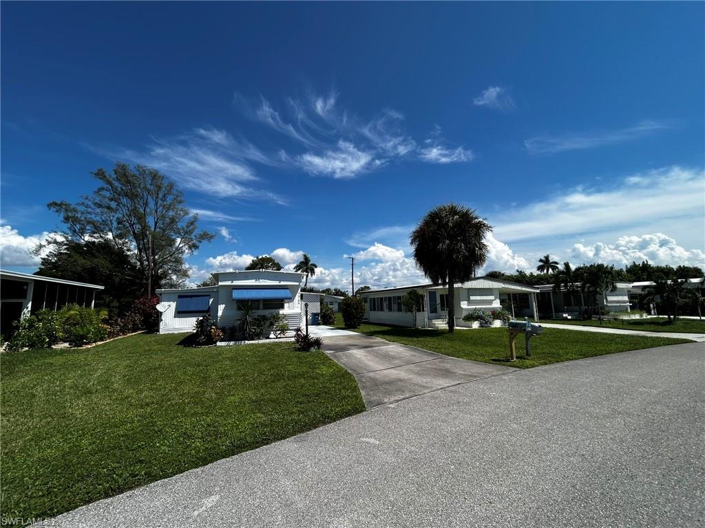 Welcome to your dream home in the heart of a serene 55+ community. This charming manufactured home has 2 spacious bedrooms, perfect for hosting guests or creating a cozy retreat for yourself. Imagine waking up to the soothing sounds of a creek flowing in your backyard, providing a peaceful backdrop to your daily routine. The kitchen is a chef's delight with butcher block counters that add a touch of rustic elegance to the space. Step outside onto the large screened lanai and enjoy your morning coffee while taking in the beauty of the community. The best part? There are no mandatory HOA fees, giving you the freedom to live life on your terms. And the cherry on top - you own the land, ensuring that your investment is secure for years to come. Don't miss out on this rare opportunity to own a piece of paradise in a community that offers both tranquility and convenience. Come see for yourself why this home is the perfect blend of comfort, style, and affordability. Your oasis awaits!

 Optional membership in the community is available for a one-time fee of $1,500.00, and an annual fee of $350.00. This membership provides access to the Harbor Club: Fitness center, pickle ball, bocce, shuffleboard, billiards and more.

We have received an estimate of $6000 for a new carport

Owner will agree to short term owner financing.