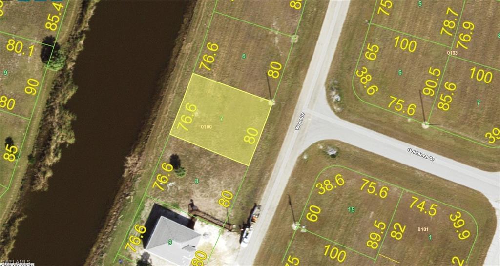CITY WATER & SEWER AVAILABLE!! Not in a zone requiring scrub jay mitigation per the county website 04/23/26 - please reconfirm during due diligence. Conveniently located to shopping, dining, banking and all that sunny Port Charlotte has to offer. New construction is everywhere you look and you can be part of the action. Information about local builders is available upon request. Also great for self directed IRAs, 401Ks and other investment portfolios. 15.7 MILES TO THE ENGLEWOOD BEACH!