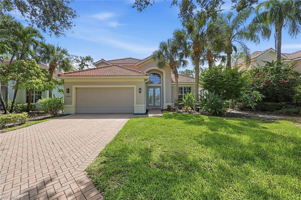 Introducing a spacious single-family home offering comfort, privacy, and an exceptional North Naples location. Soaring volume ceilings and an open, light-filled floor plan create an inviting atmosphere, while an open floor plan provides the perfect setting for both everyday living and entertaining. Step outside to the expansive screened lanai, where you'll enjoy a private preserve backdrop, a sparkling pool with waterfall feature, and plenty of room to relax or dine outdoors in peaceful surroundings. Located in a desirable gated community of Brynwood Preserve with low HOA fees, this home is just off Livingston Road, placing you minutes from world-renowned Gulf beaches, Mercato, Waterside Shops, fine dining, everyday conveniences, and top-rated Collier County schools. Whether you're looking for a full-time residence or a seasonal retreat, this property offers the ideal combination of privacy, convenience, and the Naples lifestyle.