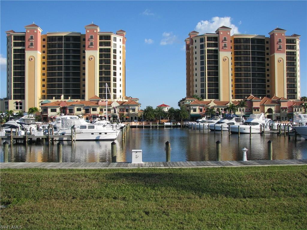 C.14094 - Wow, Come and enjoy views of Cape Harbour Marina and the surrounding area from this 12th floor condo located in the Marina South Tower. This charming condo offers an Open Great Room concept with 2 nice size bedrooms, 2 full baths, a beautiful cherry wood kitchen with granite counter tops, a raised breakfast bar, & stainless steel appliances. Indoor laundry room plus additional storage closet, tile floors throughout the unit and window treatments. Beautifully decorated and well maintained this Dominica model is being offered turnkey, so it is move-in ready and also provides an excellent opportunity for a vacation rental. Enjoy your morning coffee or an evening cocktail while seated at this spacious screened balcony. The community offers secure building entry, and parking  within the building for residents only. Private Clubhouse with pool, basketball, tennis court, fitness, meeting room, & kitchen. MARINA, entertainment, a gourmet market/shops, restaurants all at your doorstep. The boaters will love the convenience of keeping boat in the Marina both wet slips and dry storage options. NE exposure in a prestigious community could be your lifestyle.