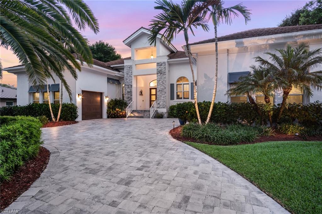 An exceptional home located in one of the most prestigious streets in Park Shore! Just a few steps away from the Park Shore private beach and Venetian Village, this luxurious modern home has been meticulously redesigned to the T with an impressive open concept floorplan. Offering 4 BR, 3 ½ baths, study, formal dining room, a 3-car garage, and an extensive patio with a complete outdoor kitchen and a saltwater pool and spa. Entertain friends and family in the spectacular great room which showcases breathtaking pool views and built-in fireplace and high-quality surround sound. The redesigned exterior of this home boasts well-built stone columns with marble steps, double mahogany front doors, and new gray pavers which is complemented by mature palm trees. The pristine kitchen exhibits an island with quartz countertops, custom pull out style drawers and décor cabinets with lighted glass doors. Kitchen appliances include a built-in refrigerator, 5 burner gas stovetop, and a built-in double wall oven. This home offers the opportunity to live in paradise! Residents are eligible for membership to the private beach and are eligible to lease/purchase a boat slip at the Venetian Bay Yacht Club