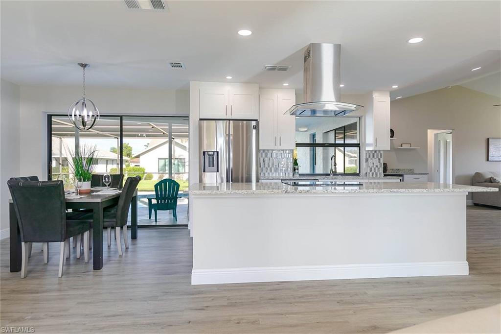 New Renovation of this 3 bed 3 bath pool home with million dollar views of the Caloosahatchee River.  Only home in SE Cape Coral with direct views of the river and without being on the river.  Split floor plan with master bed and bath on one end of the home and the opposite side has 2 additional bedrooms and 2 baths.  Everything is new or updated.  Re-plaster and tiled pool, new open concept kitchen with white shaker cabinets, new granite, new stainless-steel appliances, new luxury vinyl flooring and tile throughout the home.  Also, there is all new lighting, new doors, trim and all new baths with tile showers and vanities with granite.  Great pool deck for entertaining family and friends.  New landscaping, sod, and all new irrigation system.  The mechanicals were also updated with new AC, complete re-pipe of the home and updated wiring throughout.  Nothing to do but move in.