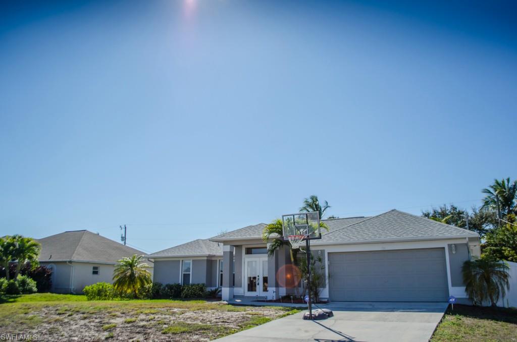 LOCATION! LOCATION! LOCATION!  Across from water!! Great neighborhood, close to everything. EASY ACCESS TO 2 MAJOR ROADS!! 3 Sets of Sliders Overlooking relaxing pool! OVER-SIZED GREAT ROOM!  Beautiful 3 bedroom, 2 bath pool home, Built in 2003! HURRY!! WON'T LAST LONG!! Fenced backyard. Privacy Fence surrounds huge yard that goes beyond the screened pool area. New flooring just put in. Great layout and wonderful clear cut lines are just waiting for you to add your touch. Almost ready to hook up to city water and sewer, buyer to assume the remaining assessments. Seller has already paid the permitting fees. Make this house your home today!!!