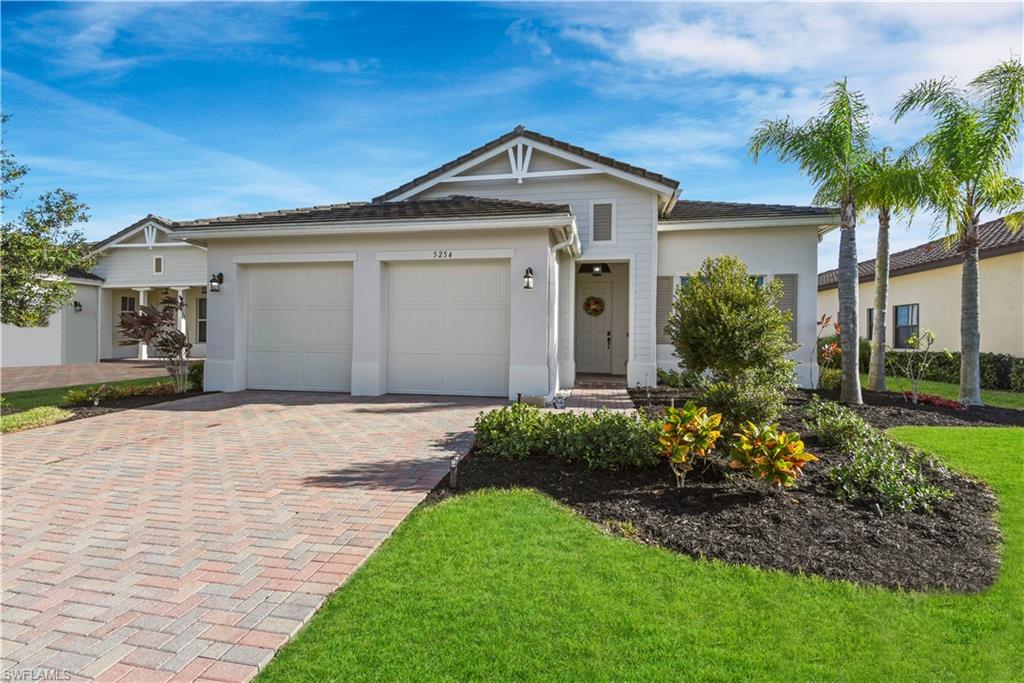 Beautiful move-in ready lakefront home in the prestigious Maple Ridge at Ave Maria!  Just built in 2015 and gently lived in, this home features a great room & split bedroom layout, upgraded tile flooring in main living areas, European style 42” wood cabinets, granite countertops, extra storage (w/ cabinets in laundry room, a 16x6 master closet, & a walk-in closet in one of the guest rooms), stainless steel appliances, eat-in kitchen area, long breakfast bar, and volume ceilings. You will love the outdoor living space that overlooks the lake w/ an extended lanai w/ brick pavers, & plenty of room for a pool. Updates to the home include-Eco-Smart tankless water heater (Feb 2019), freshly painted exterior, LED lighting throughout (interior & exterior), landscaping updates, and remote control ceiling fans. Ave Maria offers a gas station, fine dining, Publix grocery store, shopping, organic farm, dog park, golf, tennis, fitness center, water park, equestrian, medical services, baseball, soccer, Ave Maria Montessori, Donahue Academy K-12 & Ave Maria University. Plus, Maple Ridge private amenities coming soon: clubhouse, pool, fitness center w/ aerobics, tennis & more.