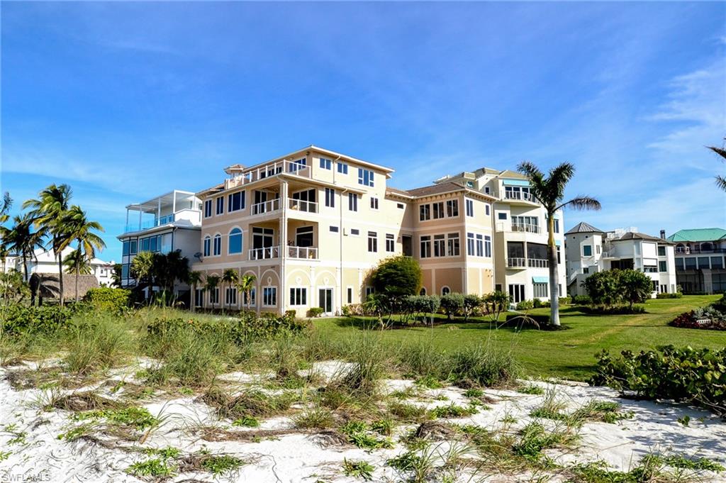 Presenting a rarely available direct beach front estate. Complete total renovation and expansion in 2015. This home sits on an uncompromising 1 and 2/3 direct beach front lots offering nearly 375’ of unobstructed west & southwest beach front views. Main living level that offers a large family living area with bar. The casual dining area offers full size dining for up to 8 and is located on the beach view. Large kitchen features custom wood cabinetry, granite tops, high end appliances, butlers kitchen, & outdoor grill area. The movie theater includes motorized theater chairs, proper risers, hd projection, and high end theater quality audio. The master suite offers large separate his & her baths & closets. Joining the suite is a beachfront sitting room & beach front lanai. The top floor offers a dedicated beachfront office space with built in work area, tv sitting area, bath, & sun deck with views of both the Naples & Sanibel skyline. There are 5 guest suites all offering high ceilings, luxury finishes, & high quality baths. The casual/entertaining area is perfect for off the beach fun.