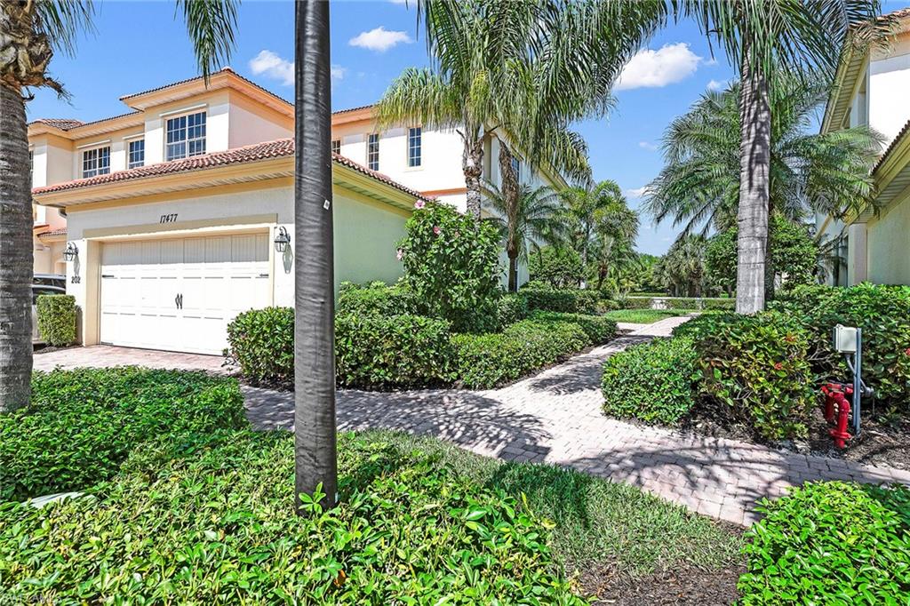 This wonderful, second-floor end unit carriage home presents over 2,100 square feet of living space and provides the feel of a single-family home with the maintenance-free lifestyle of a condominium. Enjoy three bedrooms, two full baths, full kitchen with pantry and butler area, a large, formal dining room, large master suite with tiled shower, garden tub and dual sinks. The two generous-sized guest bedrooms and guest bath are located on the opposite side of the home offering privacy for you and your guests. The spacious screened-in lanai overlooks a peaceful and bountiful preserve view. Don’t forget to enjoy the resort-style pool, well-equipped fitness center and the area’s green lush surroundings. Emerson Square is a gated community situated on the southern end of Fort Myers, and just a short drive to Estero with easy access to I-75, Gulf Coast Town Center, Coconut Point, Miromar Outlets and FGCU.