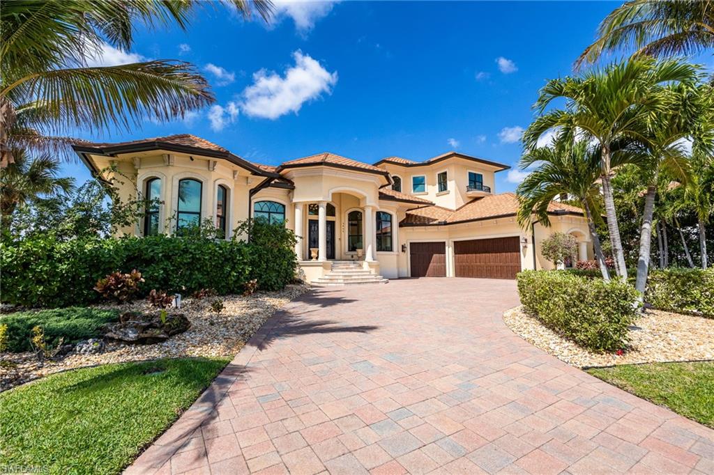 Extraordinary Caloosahatchee Riverfront Estate Modern waterfront living with panoramic river views on coveted West Riverside Drive. Positioned on highly sought-after West Riverside Drive with 105 feet of direct frontage on the Caloosahatchee River, this modern five-bedroom, five-bath residence enjoys sweeping panoramic river views. This highly sophisticated estate home offers 4,586 square feet of architecturally refined living space with soaring ceilings, exceptional craftsmanship, complemented by a well-appointed three-car garage. Expansive outdoor entertaining spaces, highlighted by a gas-heated pool and spa and elegant riverfront terraces overlooking the river, capture spectacular sunsets and long water views while creating seamless indoor–outdoor living. Custom imported iron-and-glass estate doors open to interiors distinguished by bespoke finishes, Murano glass chandeliers, designer wallpaper, and sophisticated wall treatments, reflecting a carefully curated and highly refined design aesthetic. The home is anchored by a chef’s kitchen with high-end appliances and generous entertaining space, while the primary suite enjoys a tranquil riverfront setting designed to capture the home’s panoramic water views. A rare offering along West Riverside Drive, where modern riverfront construction, sophisticated design, and so many upgrades! New roof w/ 50-year warranty, New generator, New appliances and New Storm Smart hurricane screens throughout. All on the premier Caloosahatchee River.