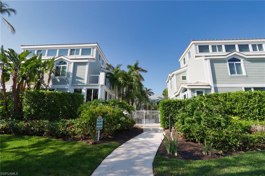 Fabulous townhouse style condo located right in the heart of Olde Naples! Intimate community of just four residences located so close to everything this highly desirable neighborhood has to offer. Two stories of luxurious, yet comfortable, accommodations offer the best of Florida living. Full two bedroom, three bath residence with den located on the ground level offering a sleeper sofa for overflow guests. Also located on the first floor is the oversized foyer sitting area, one guest bath, laundry room and private attached single car garage. The second level encompasses the living room, sun sitting area, dining room, kitchen (with small office area), both full bedrooms and two baths (one ensuite master bath and a second guest bath). The master bedroom even boasts a full desk with chair setup and a small open balcony overlooking the community pool area! The living room combination consists of a sofa, loveseat and recliner. The wood dining room table seats four. Every creature comfort has been provided to make a tenant's stay more convenient and enjoyable. Amenities include a heated pool and BBQ grill. Conveniently located just two blocks to the beach and six blocks to chic 3rd Street South offering fine shopping, dining and entertainment.