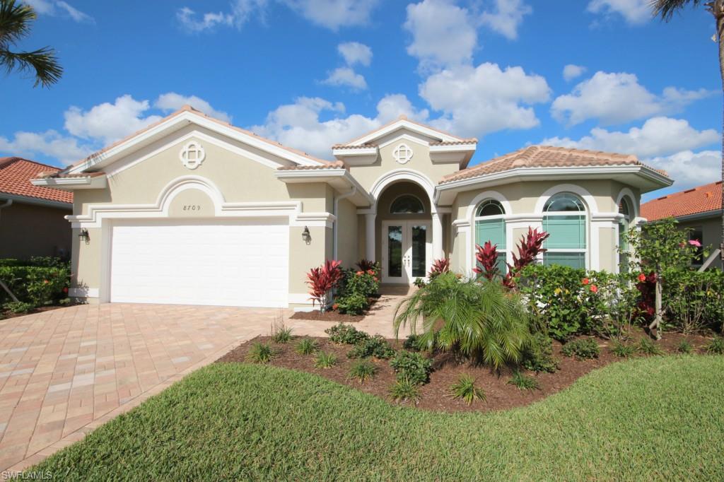 Take advantage of this unique opportunity to own a recently completed home in Belle Lago!  This "Saranac" model features an open floor plan with wonderful  spaces for comfortable everyday living or gathering with friends or family.  The gourmet kitchen features beautiful custom wood cabinetry, granite countertops and stainless steel appliances and is open to the adjoining breakfast room and large great room area.  A Formal dining room provides the perfect setting for elegant dinner parties.  A wall of sliders off the Great Room open to a covered patio and private rear yard.  The master suite features two walk in closets and a private and luxurious bath complete with his and hers vanities, a soaking tub and walk in shower.  Three additional bedrooms and two full baths provide ample space for large families or overnight guests.
Belle Lago is located just minutes from major shopping, dining and theaters as well as FGCU, Germain Arena and the Airport and a short drive to the white sand beaches of the Gulf.  The community offers 24 hour security w/staffed gate, 4 tennis courts, clubhouse, fitness & pool, spa, play area, and a private golf cart entrance to Estero Country Club