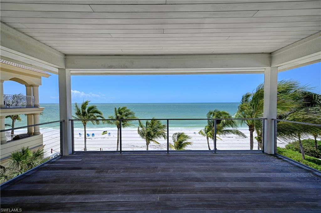 This direct Gulf Front home was previously renovated with new code roof, hardy board cement siding, impact windows and doors. The interior of the home was completely taken to the studs for a full remodel including new electric and plumbing. The contemporary styling includes European design in the kitchen with high quality appliances, clean lines & glass accents. The floors and outdoor decks of this home are all Brazilian Ipe flooring throughout. This exotic flooring material is ultra-dense and resistant to water and termite damage. Halogen lighting can be found throughout as well as custom tile and fixtures in the baths. A large deck off of the living room offers open air or a covered deck with electric retractable screens. The deck off of the master suite provides electric screens as well. The lot will accommodate a large swimming pool and deck.  This is a fantastic opportunity to own a direct Gulf front home completely up to codes and standards for a great price.